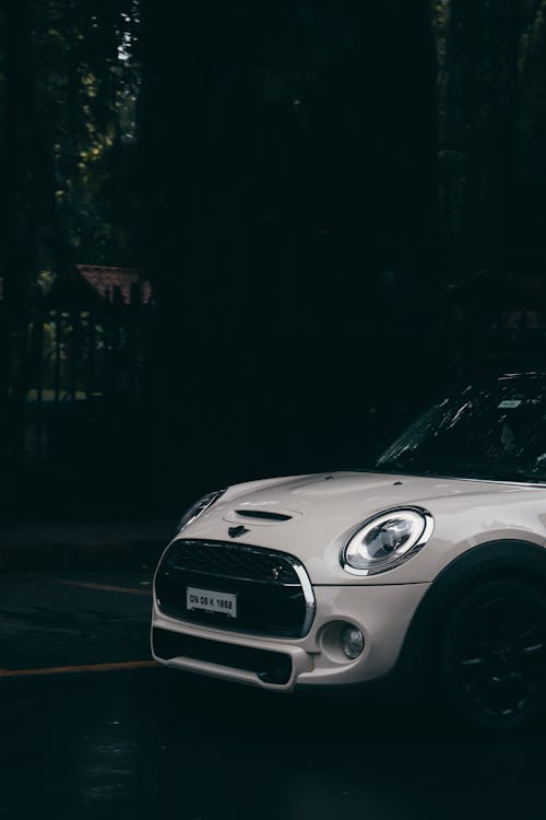 White Mini Cooper Parked on Street Side