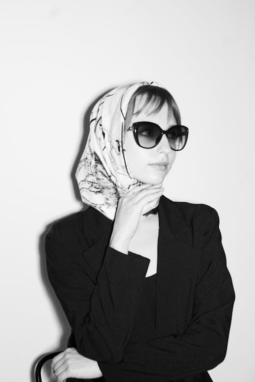 A Woman with Headscarf Wearing Sunglasses