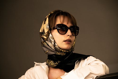 A Woman With Headscarf and Sunglasses 