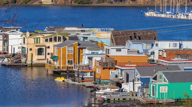 A Row Of Houses Near The Blue Sea 