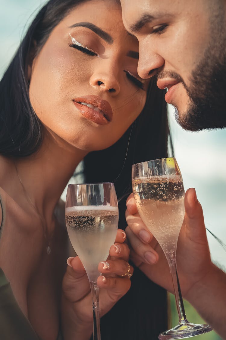 Close-up Of A Couple Drinking Champagne