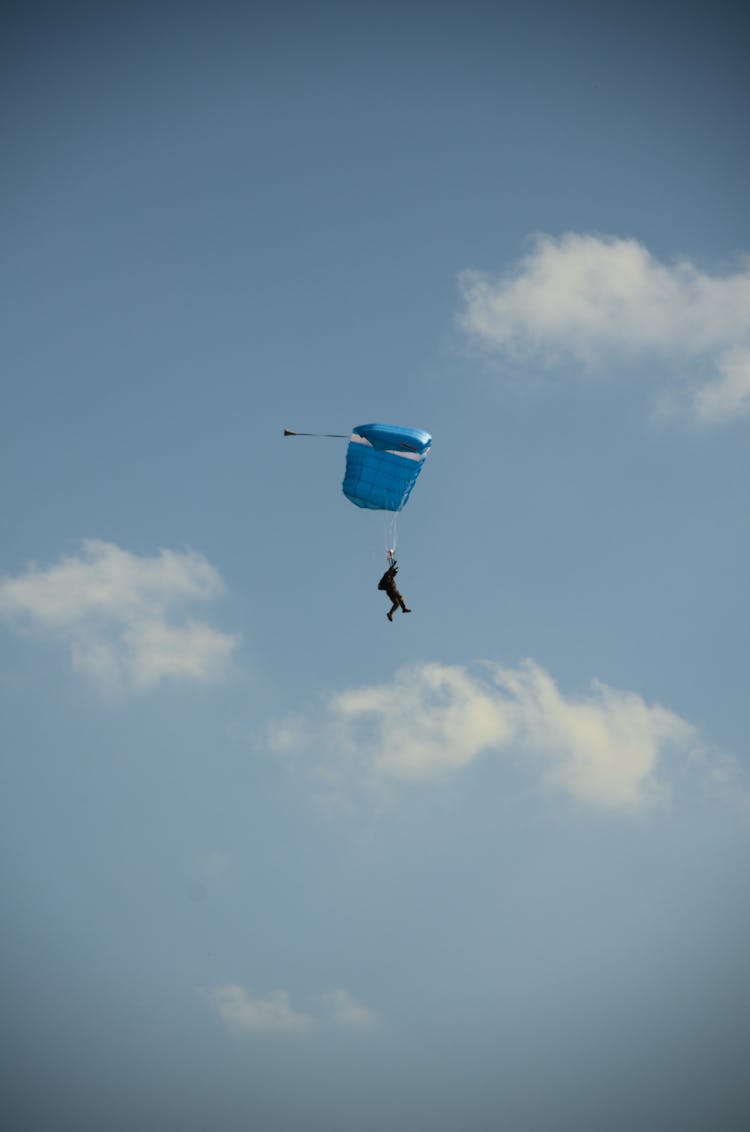 A Military Parachutist In The Sky