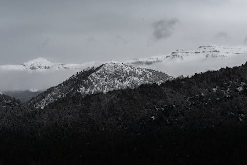 Foggy Snow Covered Mountains Photo