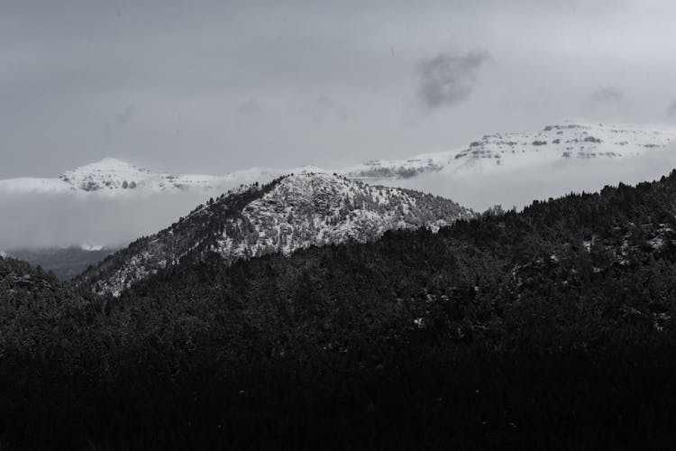 Foggy Snow Covered Mountains Photo