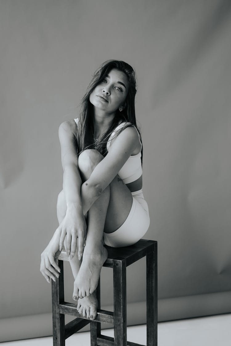 Model Sitting On Stool