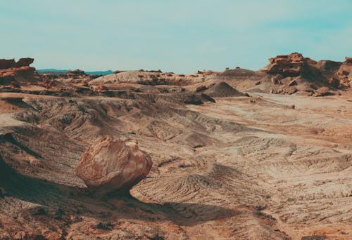 Free Landscape of a Desert with Multiple Rock Formations  Stock Photo