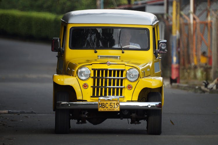 Yellow Jeep On The Road