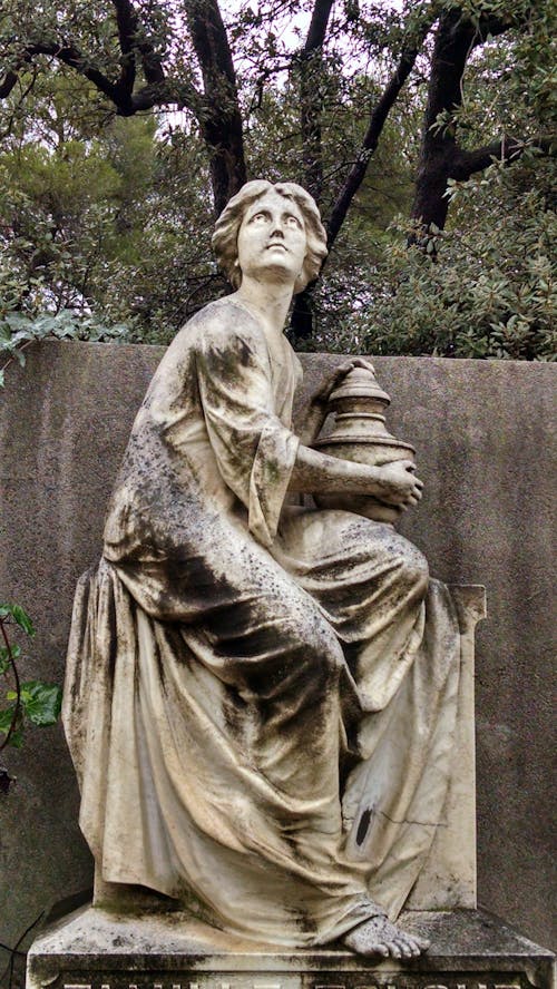 Beige Concrete Statue in Close Up Shot