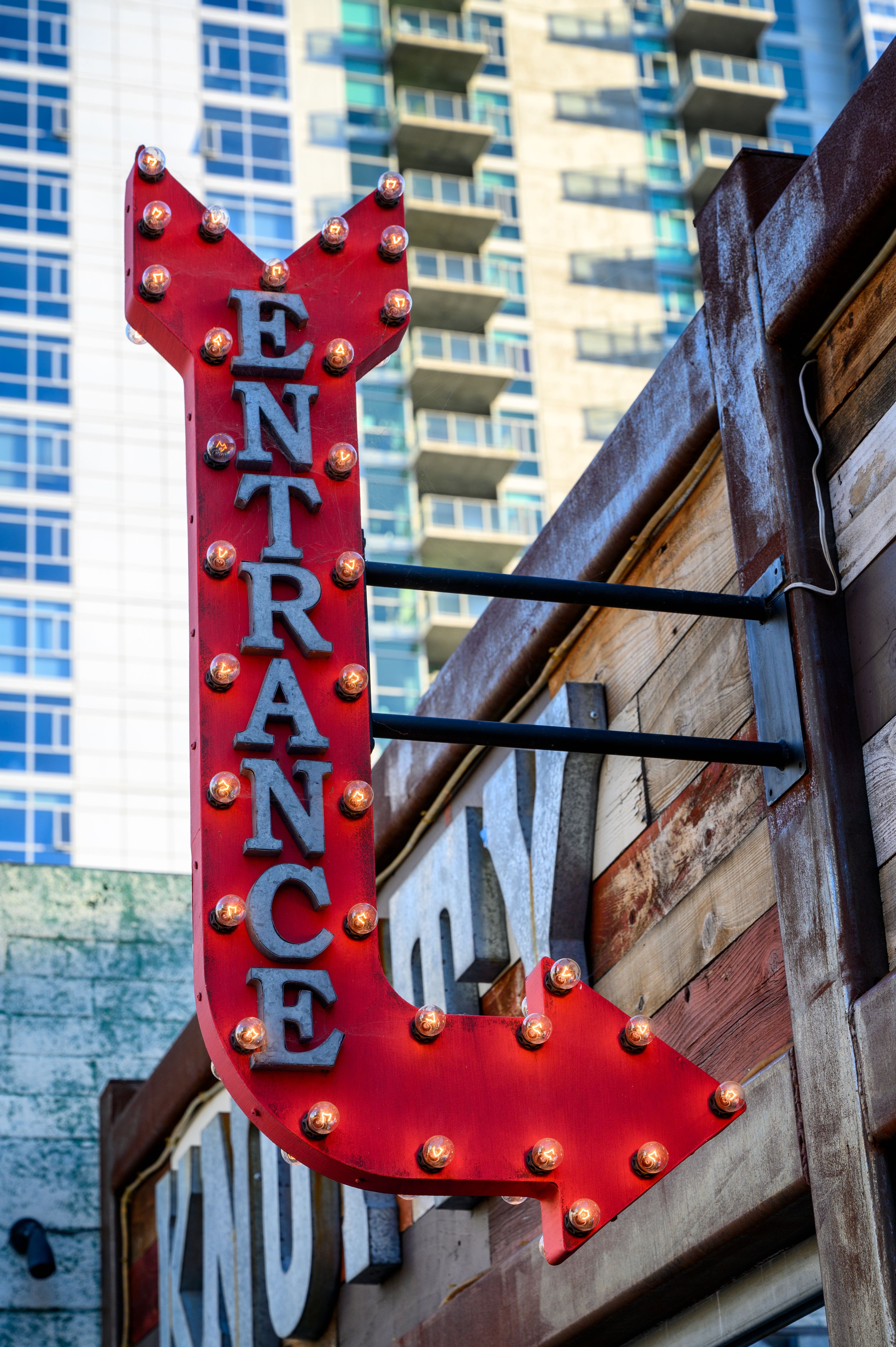 Red and Gray Text Signage on the Building · Free Stock Photo