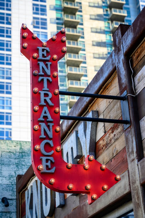 Red and Gray Text Signage on the Building