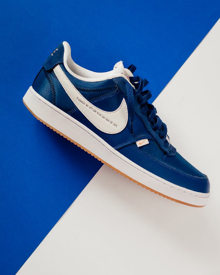 A Blue And White Nike Sneaker