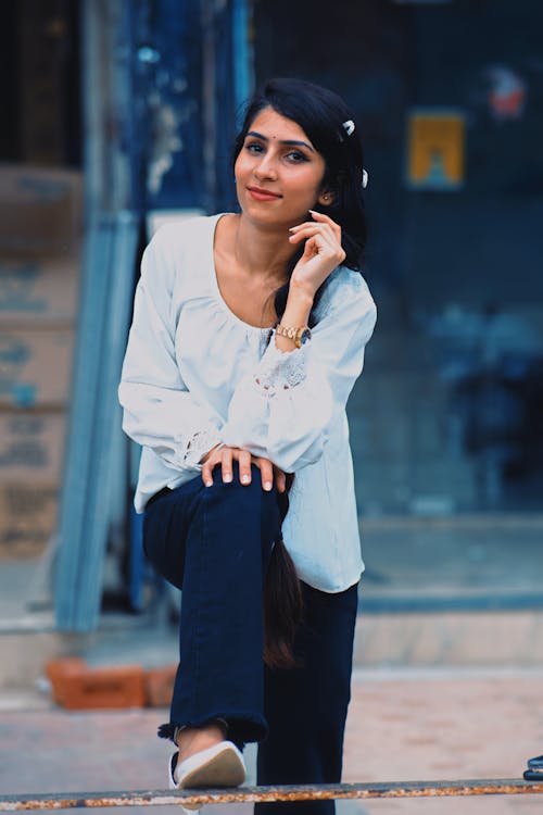 Woman in White Long Sleeve Shirt and Pants