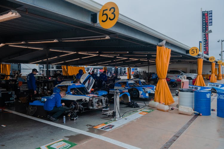 Racing Cars Parked In The Garage