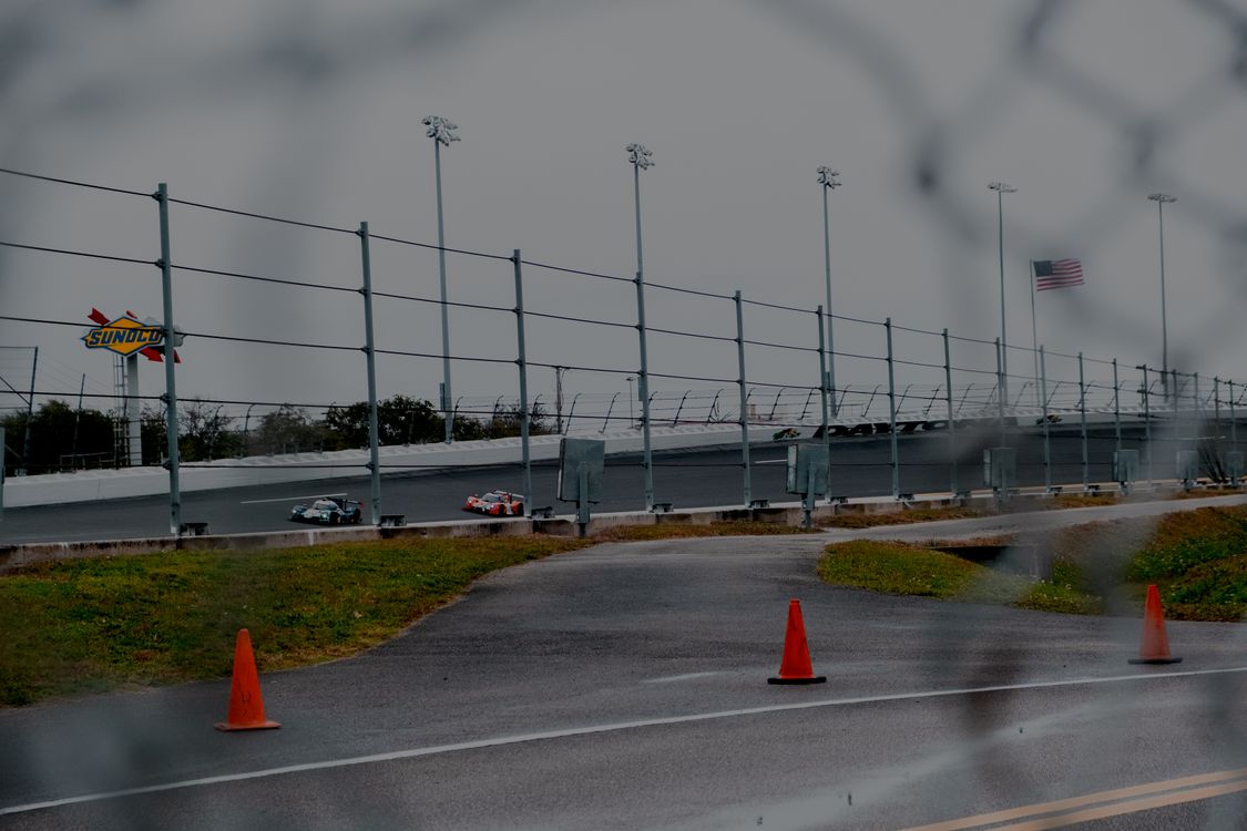 Cars Racing on a Race Track · Free Stock Photo