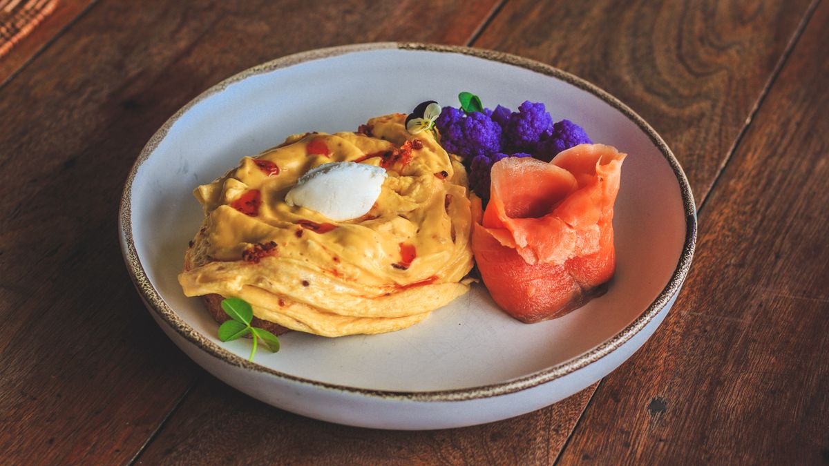 Scrambled eggs with salmon and green onion