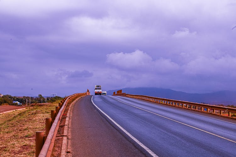 Trucks Driving On A Highway