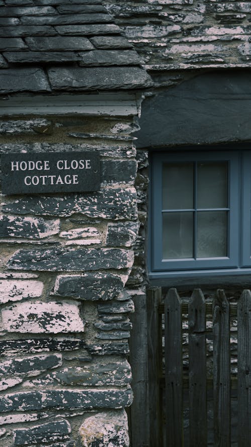 Signage on Stone Wall