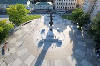 Drone shot capturing the Independence Monument at Konstytutsii Square, Kharkiv, Ukraine.
