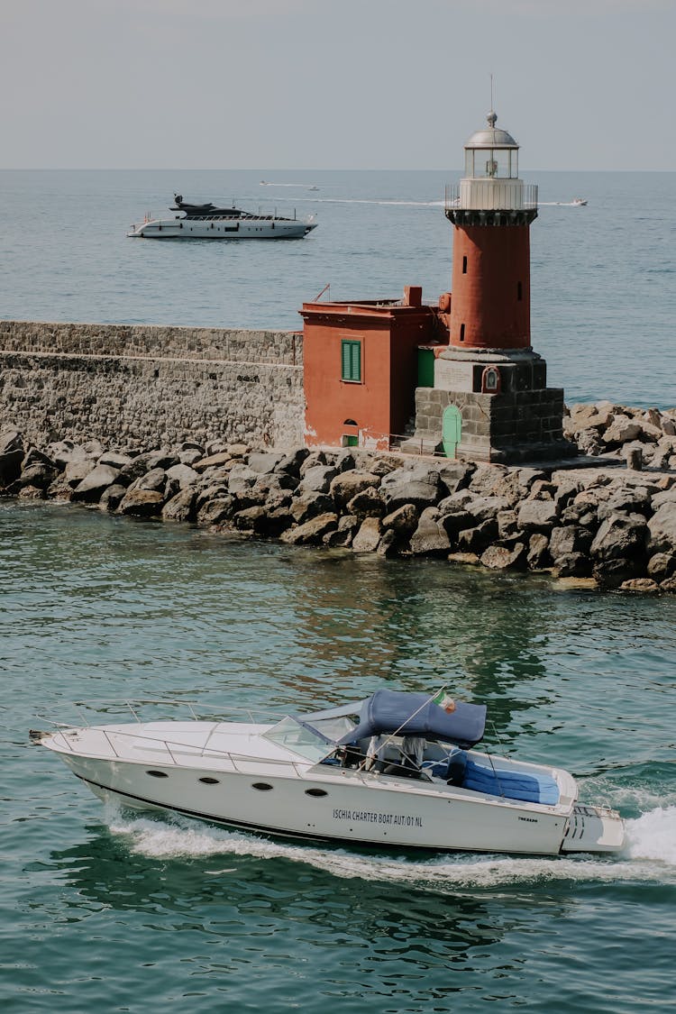 Motor Boat Sailing In Water