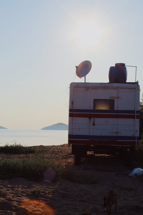 Camper Van Parked on Shore