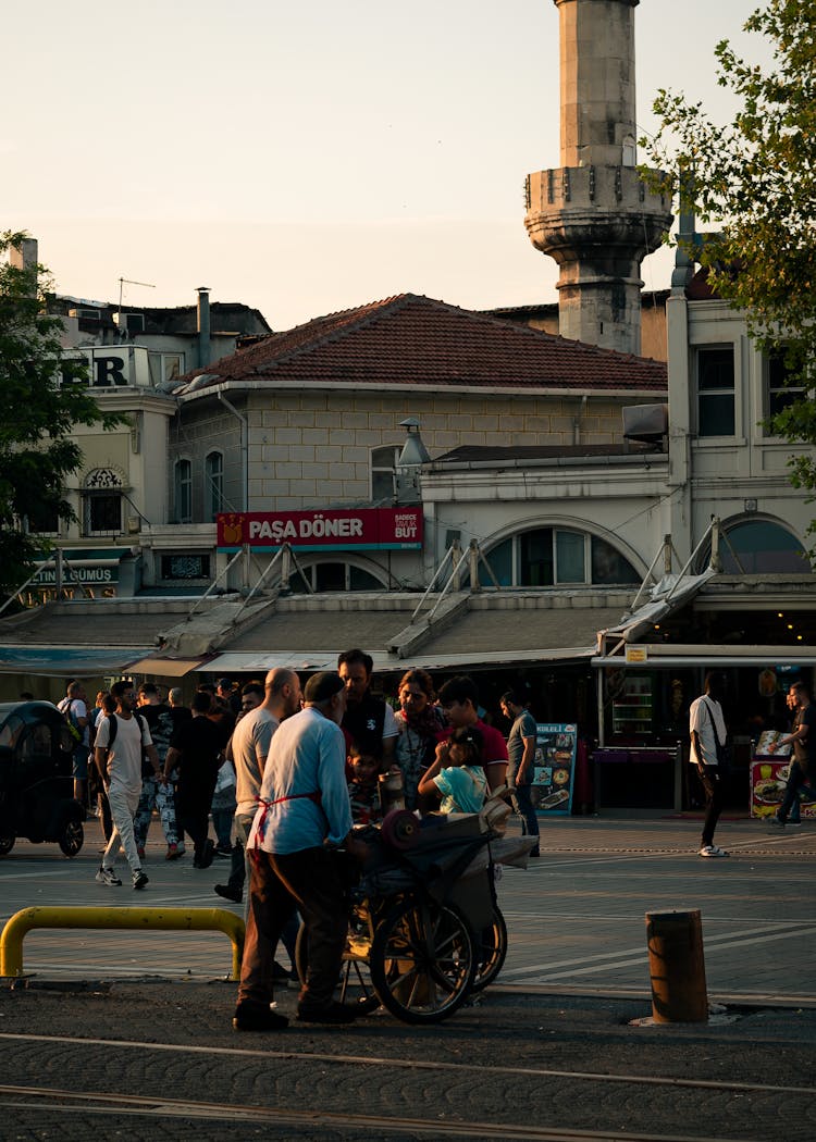 Vendor Pushing A Cart