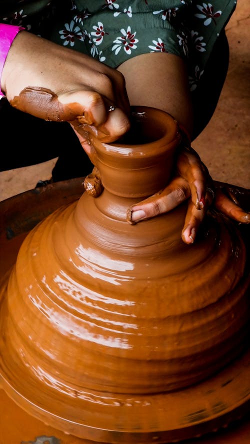 A Close-Up Shot of a Person Doing Pottery