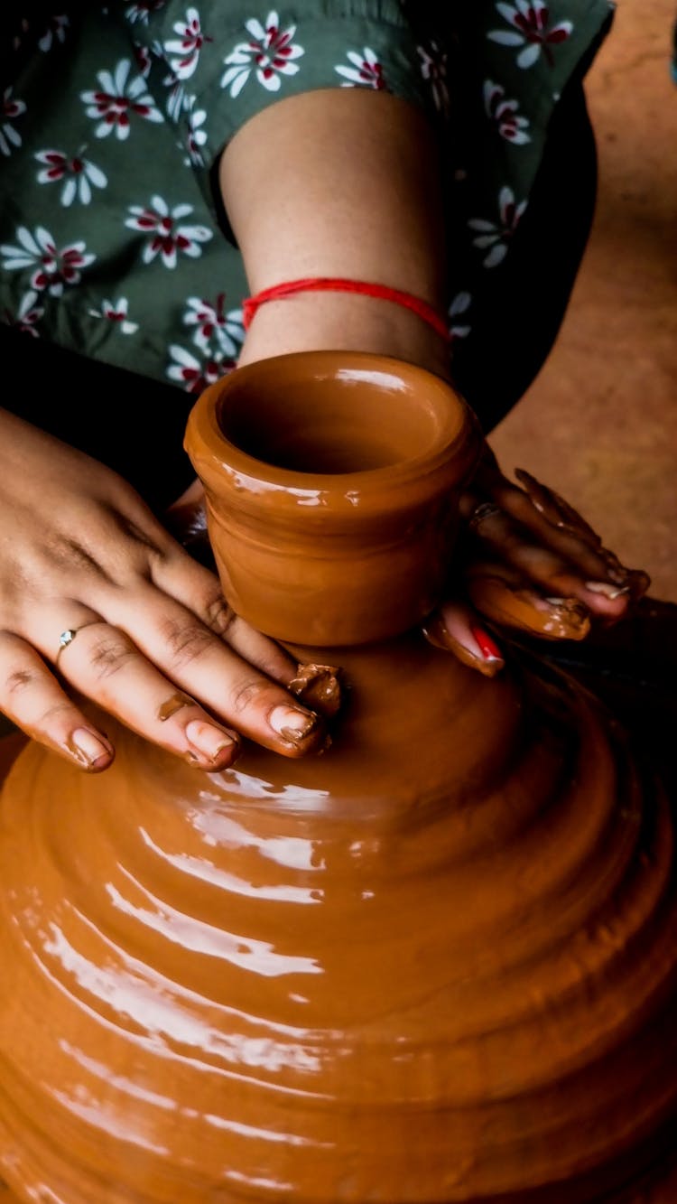 Hands Making Clay Pot