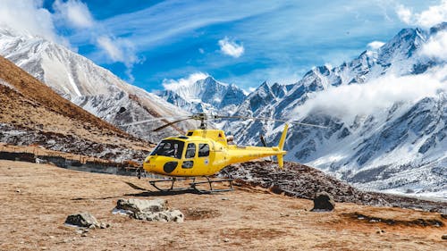 Free Yellow Helicopter on Brown Ground Stock Photo