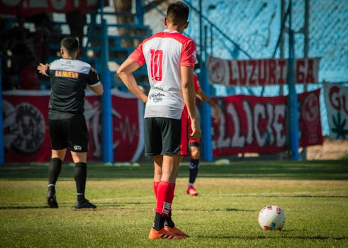 Action-packed soccer match in Mendoza, showcasing vibrant competition and athleticism.