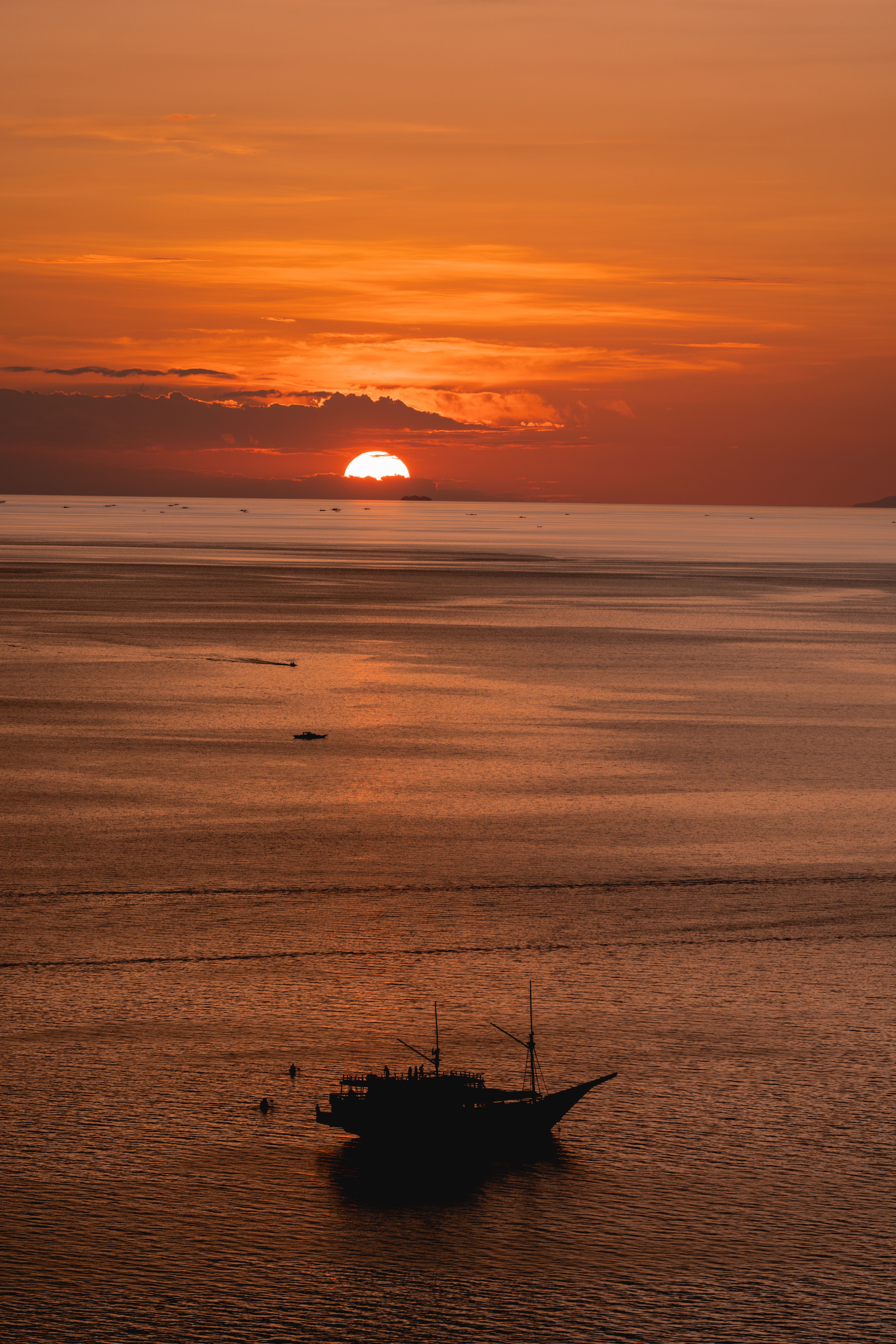 Silhouette of Boat on Sea during Sunset · Free Stock Photo