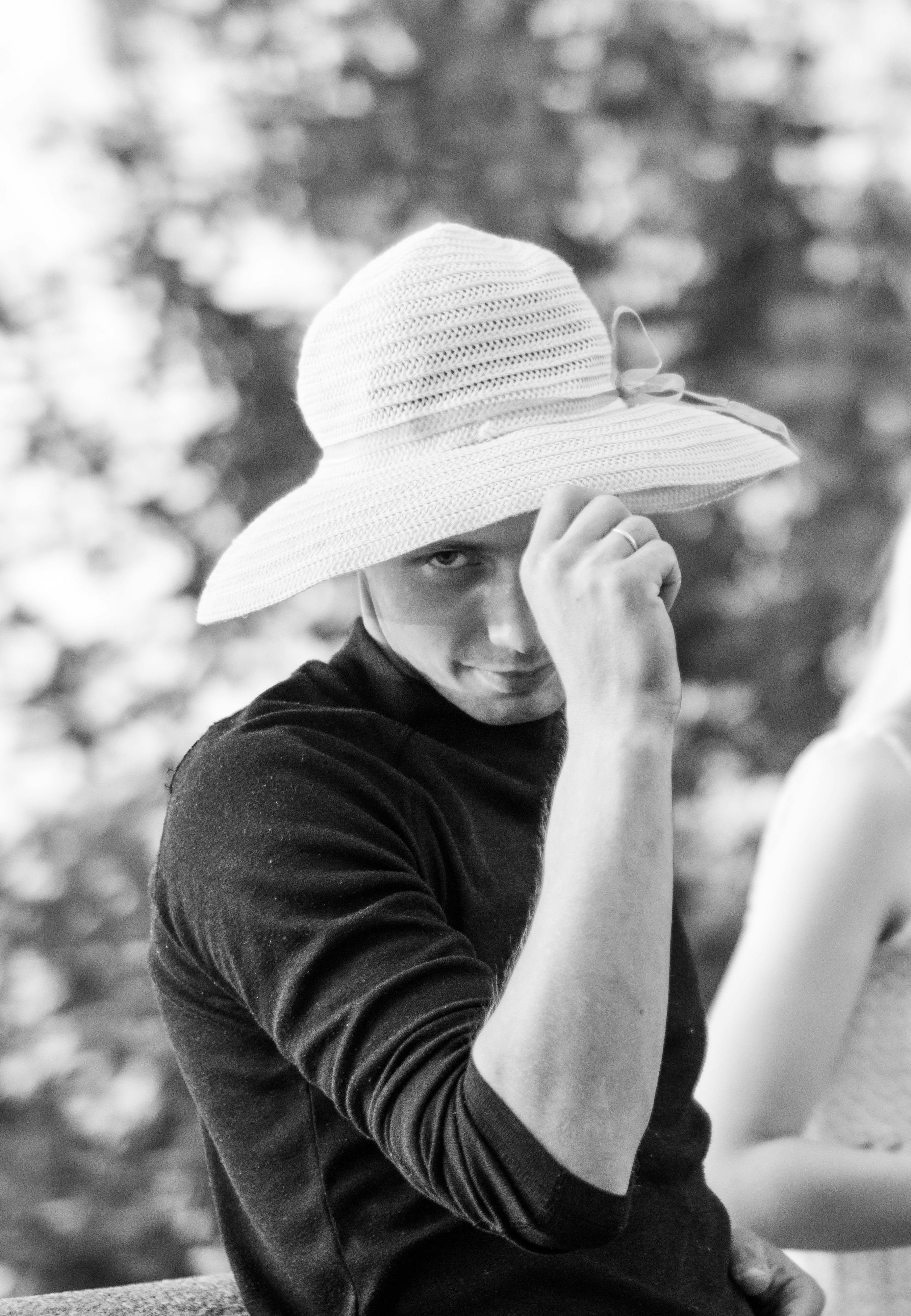 Grayscale Photo of a Woman Covering Her Body with a White Fabric · Free