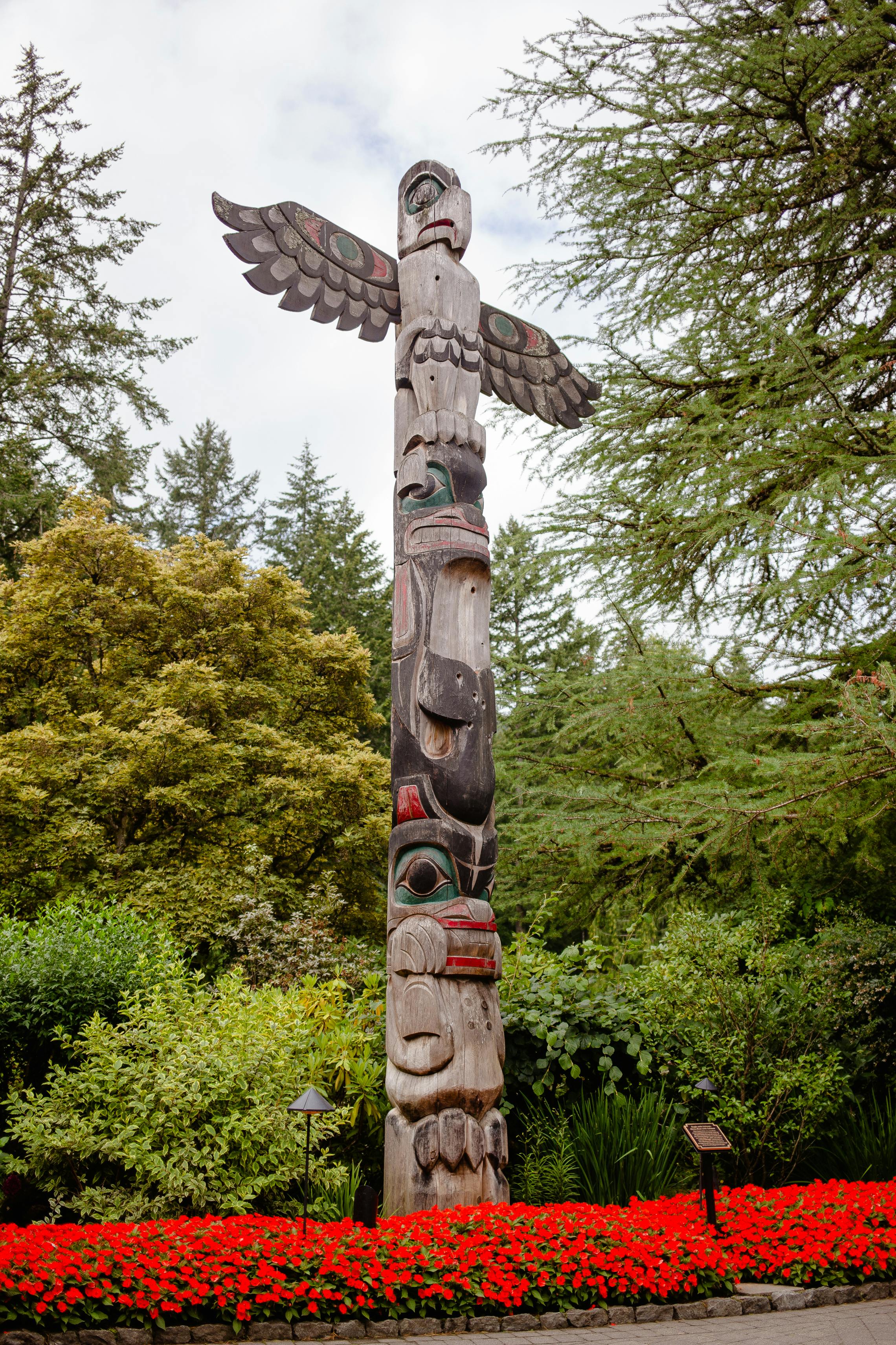 Trees near a Totem Pole · Free Stock Photo