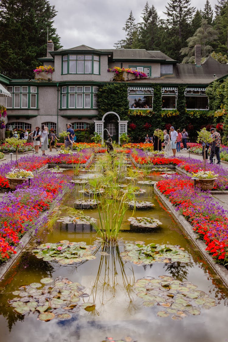 People At The Butchart Gardens In British Columbia, Canada