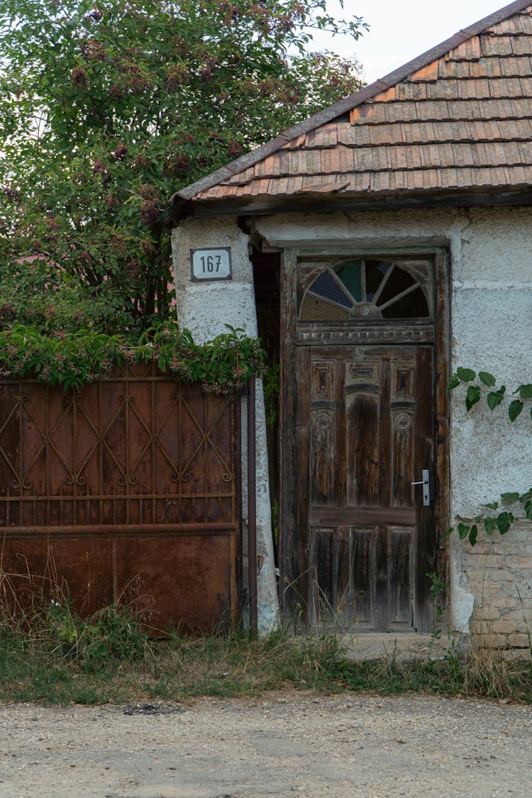 Abandoned House With Broken Front Door