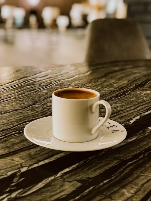 Free Cup of Coffee on Top of a Table Stock Photo