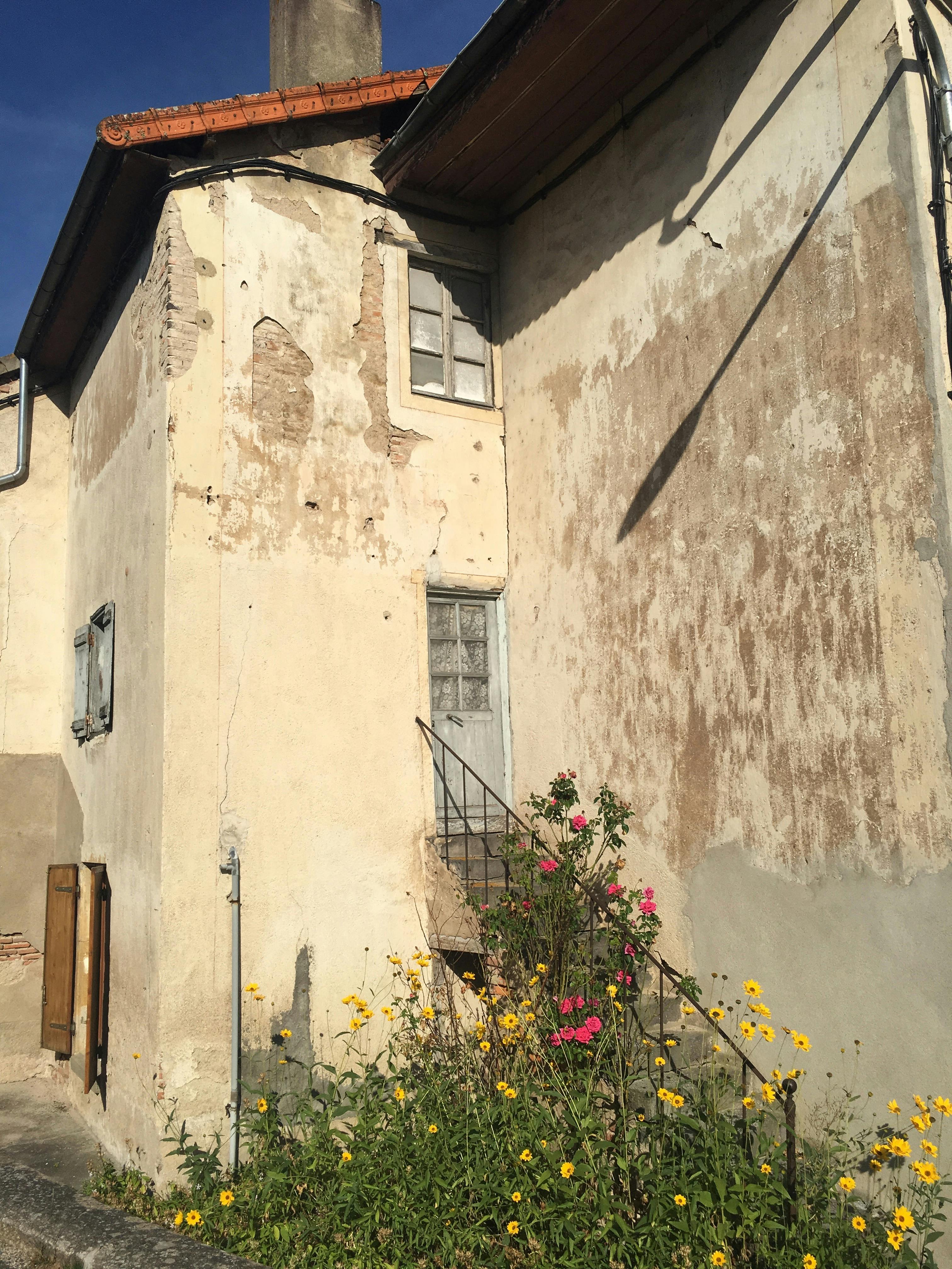 Golfer hitting a shot from the fairway at sunset