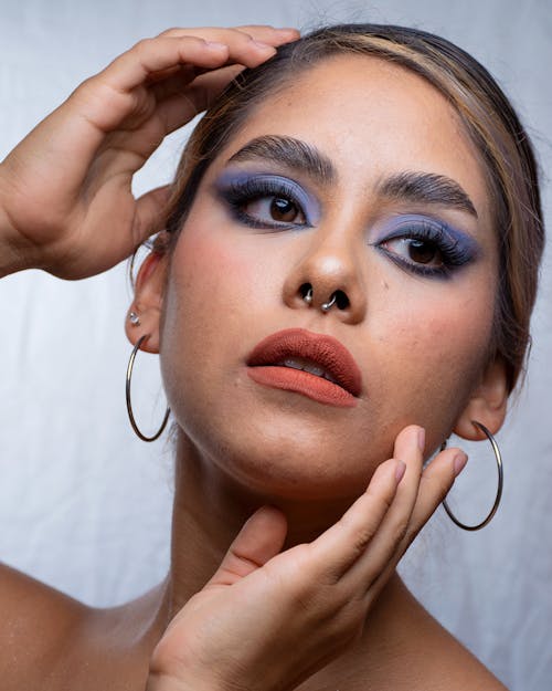 Close Up Photo of Woman's Face