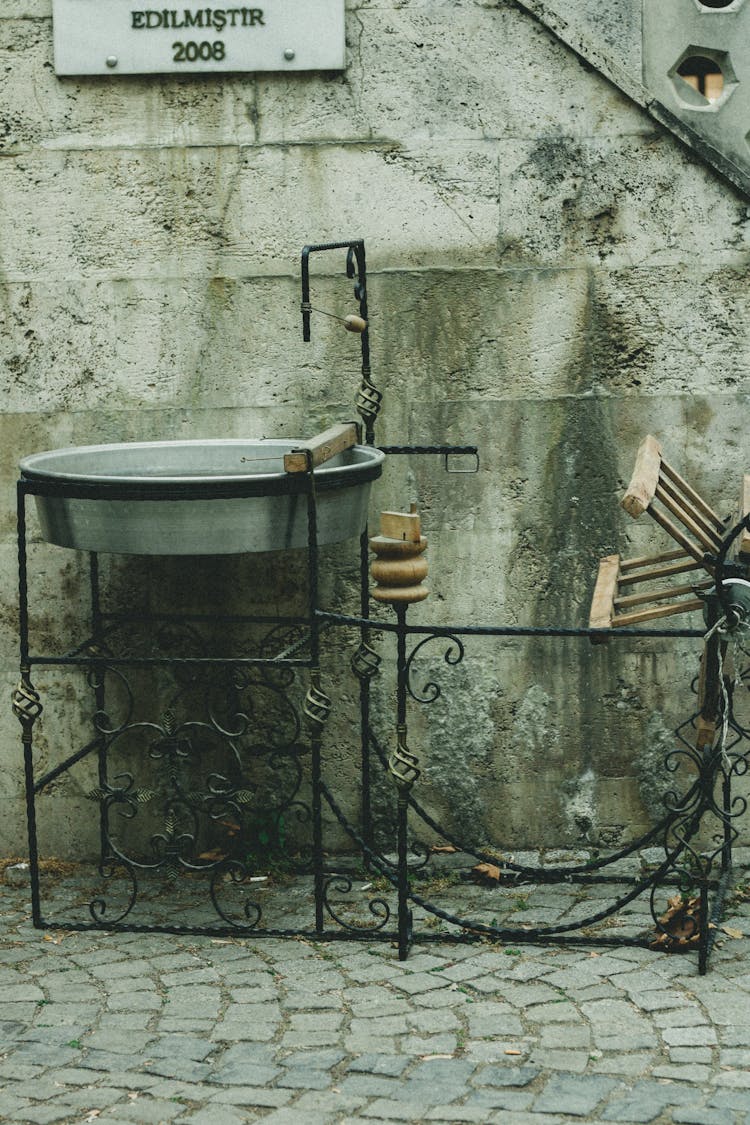 Art Installation Of A Steel Wash Bowl On City Street