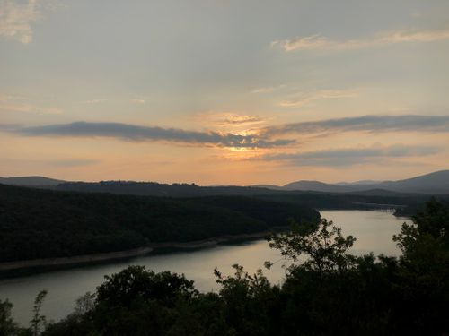 Field notes folder cover: river valley at sunset — Busra S. on Pexels