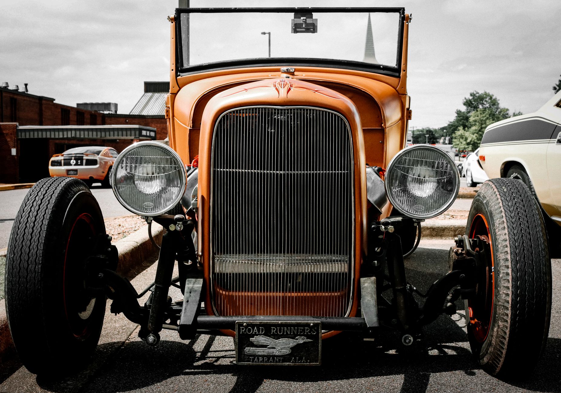 Front view of a classic Ford Roadster at an outdoor car show in Gardendale, Alabama.