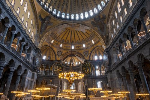 Free Exquisite interior of Hagia Sophia showcasing its ornate dome and chandeliers. Stock Photo