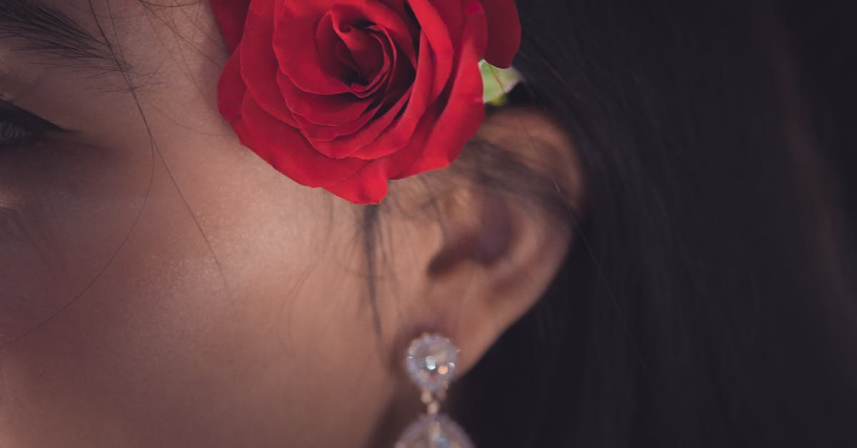 Red Rose on Women\'s Ear