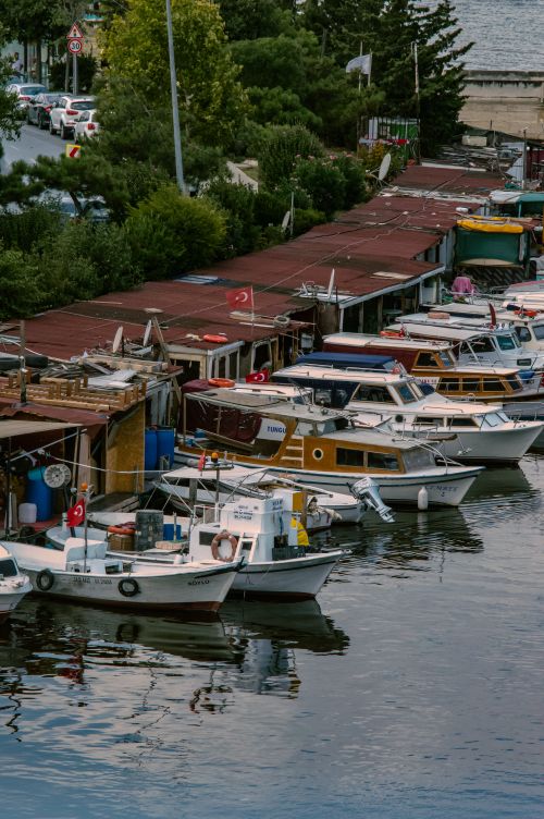 Free Aerial view of fishing boats moored at a picturesque dock in Istanbul, Turkey. Stock Photo
