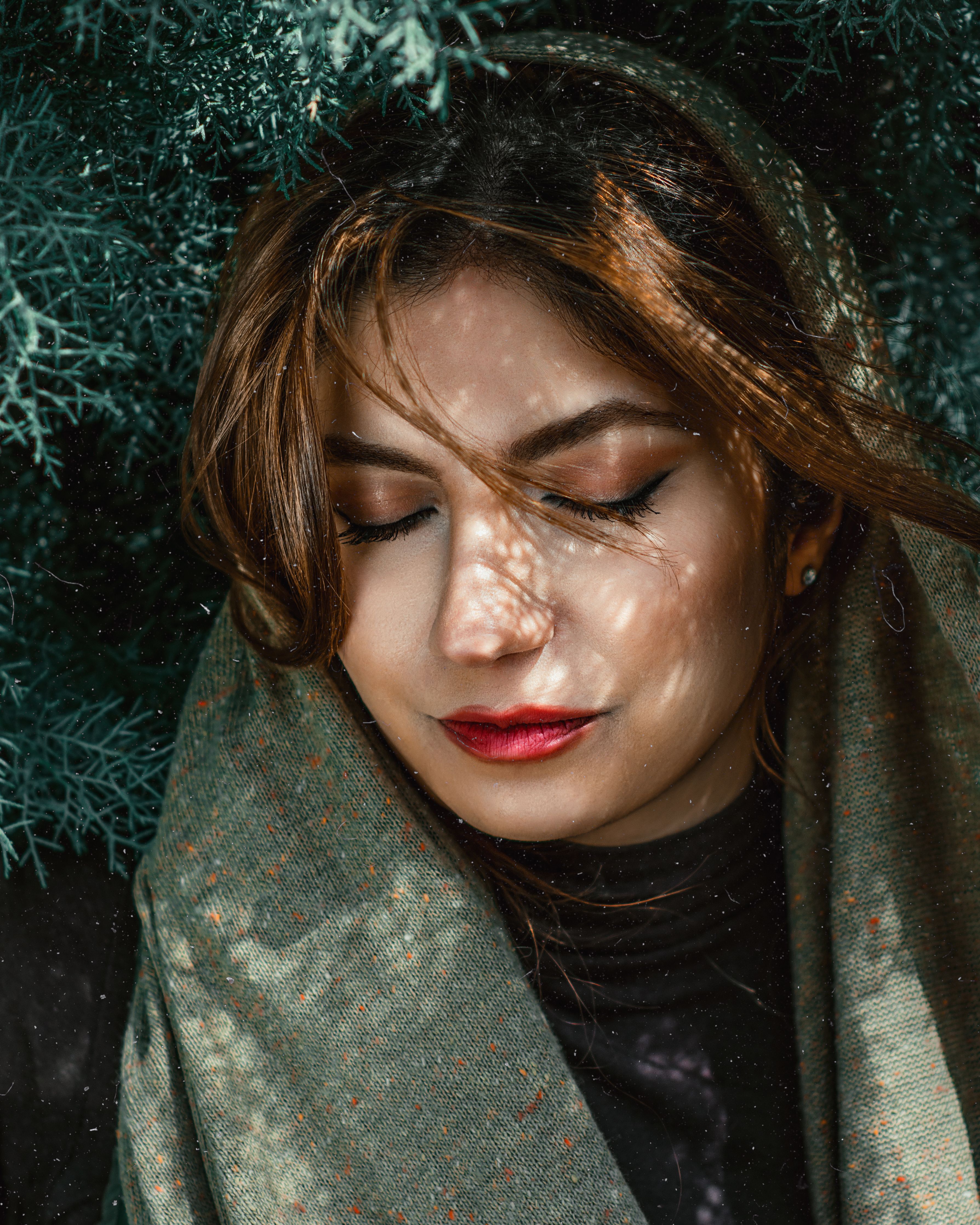 Portrait of a Woman with her Eyes Closed · Free Stock Photo