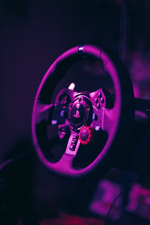 Close-up Photo of a PlayStation Steering Wheel