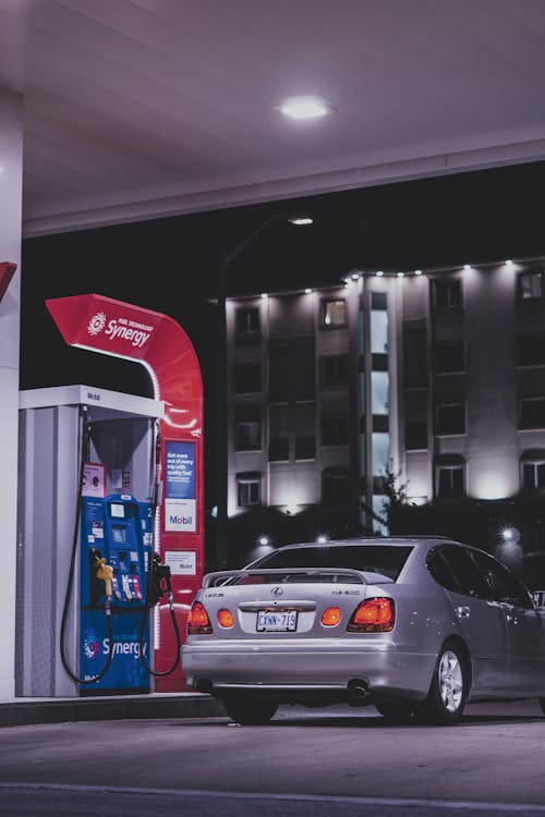 Free A Car Loading Gas in a Gasoline Station Stock Photo