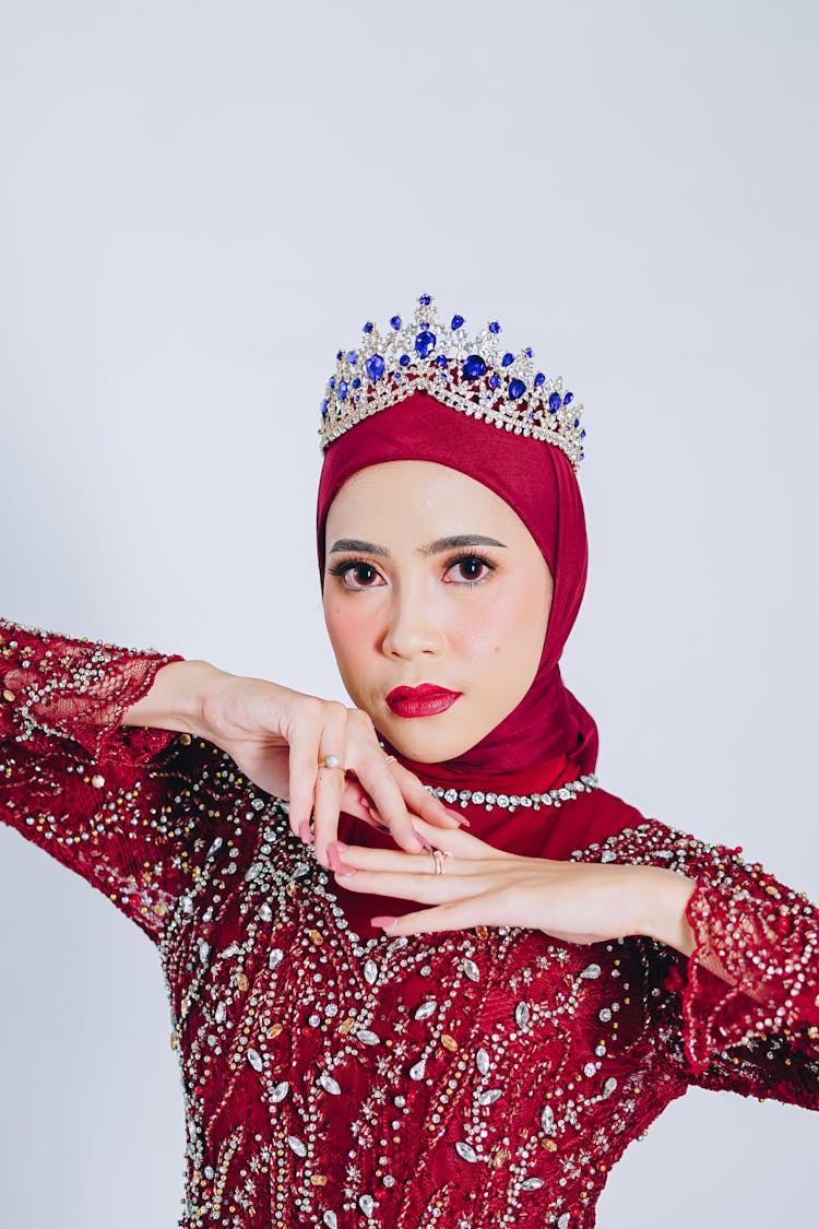 Woman With Red Hijab And Crown