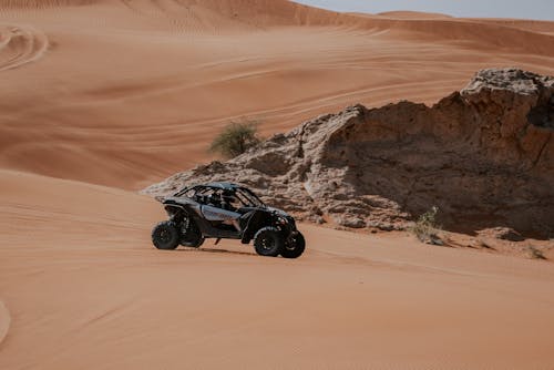 Black and Gray Dune Buggy on Sand Dunes