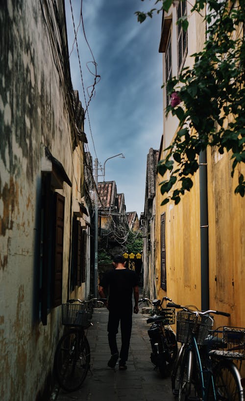 Fotos de stock gratuitas de arquitectura tradicional, bicicletas, callejón