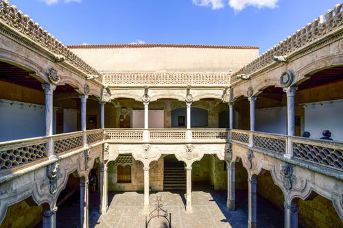 Free Intricate Gothic architecture of a historic courtyard in Salamanca, Spain. Stock Photo